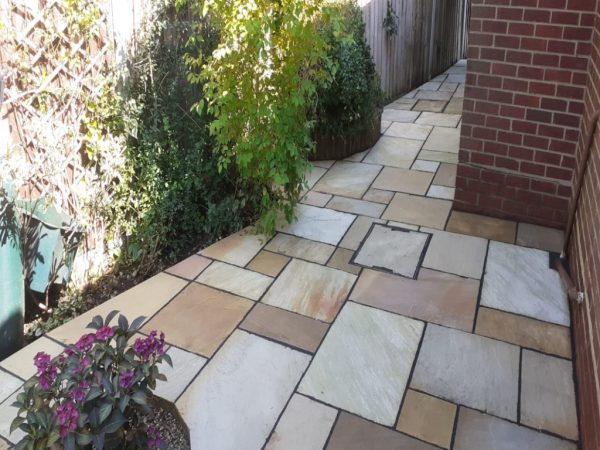 Sandstone patio installation in Kings Stanley