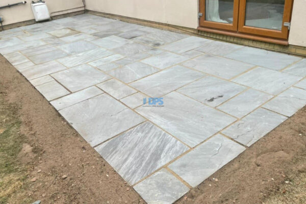 Grey Sandstone Slabbed Patio With Buff Grout In Cheltenham 7.jpeg